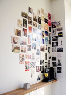 there is a wall with many pictures on it