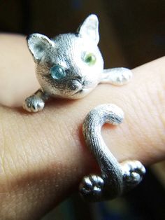 A handcrafted cat ring made of 925 sterling silver Delicate Features, Leather Carving, Cat S, Pet Urns, Charm Making, Cat Jewelry, Silver Rings Handmade, Handmade Sterling Silver, Custom Engraving