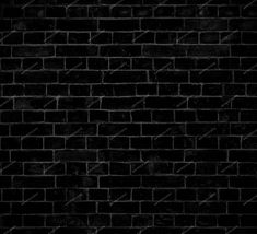 a black brick wall that is very dark