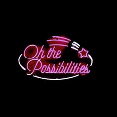 i'm the possibilities neon sign on a black background with red lettering and stars