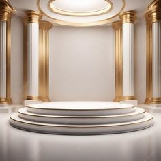 an empty room with gold and white columns