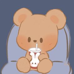 a brown teddy bear holding a drink in it's mouth