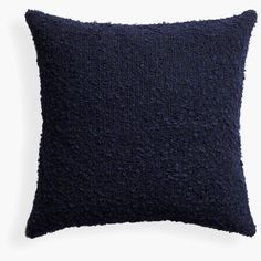 a black pillow on a white background