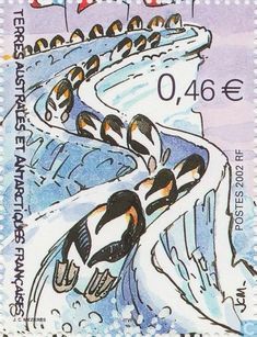 a postage stamp with an image of people skiing down a snow covered mountain side road