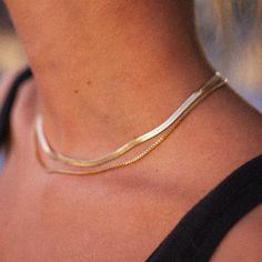 Elevate your style with this 18K gold plated stainless steel herringbone chain necklace. Its minimal and simple design exudes elegance, making it a versatile addition to your jewelry collection. The necklace is hypoallergenic, waterproof, fade-resistant, and tarnish-free, ensuring its beauty lasts for years. With proper care, the gold plating will remain radiant for at least 2 years. Perfect for everyday wear or special occasions. 14.5"L+2" extender. Herringbone Chain, Staple Pieces, Initial Necklace, Gold Plating, Simple Design, Herringbone, Simple Designs, Gold Filled, Jewelry Collection