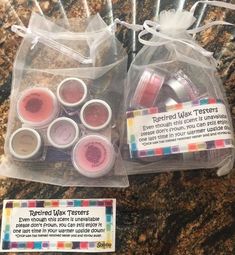 two bags filled with different types of lip polish