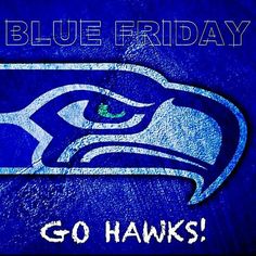 a blue sign with the words go hawks on it and an image of a football helmet