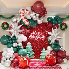 a christmas display with balloons and presents