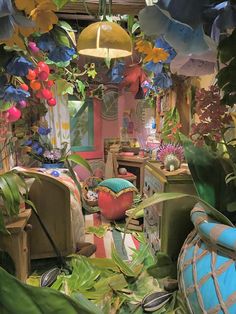 a room filled with lots of different types of plants