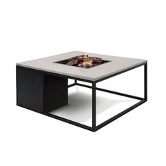 a square table with a fire pit on top