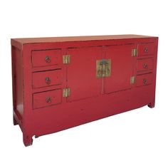 an old red cabinet with brass handles and knobs on the doors is shown against a white background