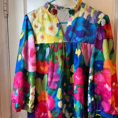 Cute Floral Blouse With Different Bright Colors. V Neck With Ruffle Around It, Long Sleeve, Gathered At The Chest. Pattern Is Printed On The Fabric. Length Of Blouse = 27.5", Chest Measurement Pit-To-Pit = 18". Unbranded. Never Worn. Art Teacher, Floral Blouse, Multi Colored, Bright Colors, Blue Yellow, Top Blouse, Womens Tops, V Neck, Yellow