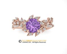 a ring with a purple stone surrounded by white diamonds and leaves on the side, set in 18k rose gold