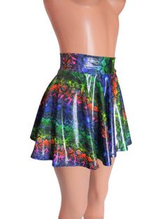 "Rainbow Snakeskin Twinkle print spandex skater skirt 15\" shown on mannequin.High waist skirt can be worn lower or higher most skirts allow you to place the waistline where it suits you, on your particular body shape and personal desire! this fun flirty skirt is a full circle design and can be ordered in lengths of 10 inch, 12 inch, 15 inch and 19 inch- if you need a longer length contact me for a quote. Any of my items can be made in any spandex fabric, also any item can be matched if you like Skirt Circle, High Waist Skirt, Rave Wear, Full Circle, Circle Design, Matching Top, Circle Skirt, Sheer Fabrics, Spandex Fabric