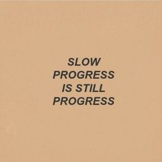 the words slow progress is still progress written in black on a beige background with an orange border