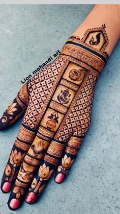 the hand is decorated with intricate designs