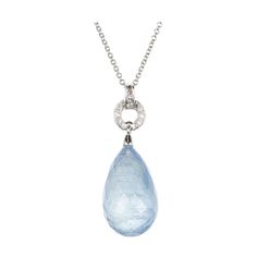 20.00ct natural Aqua and diamond pendant necklace. Art Deco Style briolette aquamarine stone with diamond accents set in platinum. 1 Natural untreated no heat Aqua briolette 20 x 12.3mm, approx. total weight 20.00cts translucent, moderate natural wispy inclusions 9 single cut diamonds, approx. total weight .07cts, G to H, VS Platinum Tested: Platinum 4.9 grams Top to bottom: 34.30mm or 1.35 inches Width: 1/2 inch Briolette Diamond, Art Deco Pendant Necklace, Platinum Pendant, Ruby And Diamond Necklace, Necklace Art Deco, Gold Slides, Sapphire Necklace Pendants, Necklace Art, Platinum Rose Gold