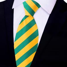 Green and Yellow Stripe Tie Step into a world of vibrant style and undeniable sophistication with the Green and Yellow Block Stripe Silk Luxury Necktie. This exquisite accessory combines the elegance of silk with a captivating block stripe pattern, showcasing a harmonious fusion of green and yellow hues that will instantly elevate your ensemble to new heights of fashion excellence. Crafted from the finest silk, the Necktie boasts a sumptuously smooth texture that exudes opulence and refinement. Charcoal Gray Suit, Light Blue Dress Shirt, Yellow Hues, Vibrant Style, Light Blue Dresses, Blue Shirt Dress, White Backdrop, Stripe Silk, Dynamic Design