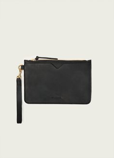 The leather wristlet is a streamlined carry for your essentials. When a bag is too much, the wristlet carries a phone, cards, and cash with ease and security.