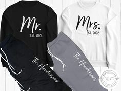 two personalized sweatshirts and sweatpants with the names mr and mrs on them