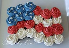 cupcakes with red, white and blue frosting in the shape of an american flag