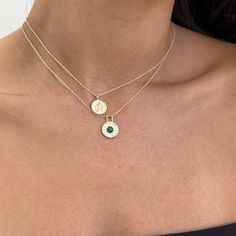 Made with beautiful malachite stones, this necklace features a one-of-a-kind pendant with intricate wave designs. Make a stylish statement with this unique piece that is sure to turn heads.Use its adjustable length to style it longer or shorter on the neck. - Gold vermeil, sterling silver- 1/2" pendant with Malachite - 15/16" adjustable chain length- Approximately 2.78 grams- Lobster clasp closure Elegant Malachite Round Pendant Necklace, Elegant Medallion Necklace For May Birthstone, Gold Malachite Round Necklaces, Gold Malachite Round Necklace, Gold Malachite Necklace For May Birthstone, Gold Malachite Gemstone Necklace, Malachite Stone, Wave Design, Gold Plated Sterling Silver