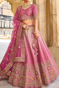 Bridal lehenga. Heavy embroidery and stone work. LEHENGA FABRIC: Heavy Fabric BLOUSE FABRIC: Heavy Fabric DUPATTA: Pure Net COLOR: Pink Bonus offer - Receive a free mystery gift with your order. Stitching Option - We will email you the measurement guide to confirm your size. SHIPPING: The product will be shipped within 1 - 2 weeks from the date of purchase. Product is returnable if un-Stitched This product qualifies for free shipping For any Rush/Urgent orders please email us at customercare@des Pink Bridal Lehenga, Latest Bridal Lehenga Designs, Blouse Lehenga, Bridal Lehenga Designs, Latest Bridal Lehenga, Raw Silk Lehenga, Wedding Lehenga Designs, Bridal Lehenga Red, Gaun Fashion