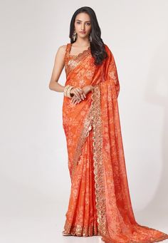 Organza Saree with blouse in Orange colour 1102 Desc: Color : Orange Fabric : Organza Work : Printed Sequence Wash Care : Dry clean Sleeve Style : Sleeveless Long Sleeves : Done only in Custom Stitch Sleeves Lining : Done only in Custom Stitch Bust Size : 32 to 42 Inches Occasion : Party Wear Engagement Reception Ceremonial Festival Kitty Party Sangeet. With Express Free Shipping Buy Indian Party wedding and bridal Sarees Organza Saree with blouse in Orange colour 1102 online ... Printed Organza, Floral Print Sarees, Orange Saree, Organza Blouse, Party Kleidung, Printed Saree, Elegant Saree, Wear Saree, Organza Saree