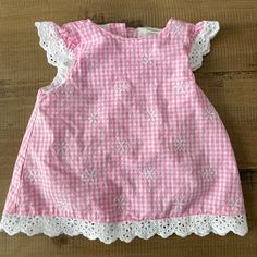 Gingham Style Baby Tunic. Never Worn, Just Dropped The Tags Off In Excitement! Let Me Know If You Want To Add This To Your 3 For $25 Bundle. I Will Adjust The Price! Cute Plaid Ruffled Tops, Cute Plaid Short Sleeve Tops, Cute Short Sleeve Plaid Tops, Gingham Cotton Short Sleeve Tops, Cute Gingham Top For Picnic, Cute Cotton Plaid Tops, Cute Plaid Cotton Tops, Cute Ruffled Tops For Picnic, Playful Plaid Summer Tops