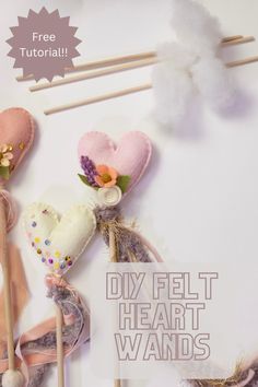 several felt heart wands are arranged on a white background with the words diy felt heart wands