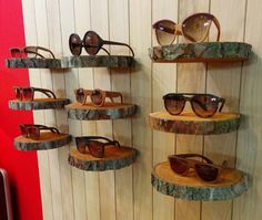 there are many pairs of sunglasses on display