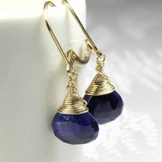 Gorgeous sapphire earrings are handmade with exquisite bright blue large sapphire gemstones. Finely faceted and flawless, these sapphire earrings will impress! Hand wrapped with 14k gold filled wire and set on leverback earring closures (ones which clasp securely on the back).Give a fabulous gift to your sweetheart born in September. Sapphire is her birthstone.Earring Details:- Earring Length including leverback closures is over 1 inch long (2.54 cm)- Sapphire gemstone by itself is 12 mm high an Teardrop Earrings Gold, September Sapphire, Bridal Party Jewelry, September Birthstone Jewelry, Leverback Earrings, Birthstone Earring, Clothes Style, Sapphire Necklace, Sapphire Earrings