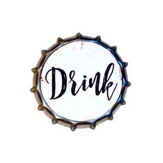 a bottle cap with the word drink written in black and white ink on it's side