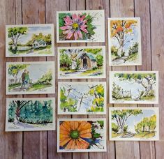 several cards with pictures of houses and trees on them