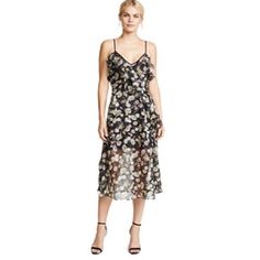 Talulah Playful Flounce Midi Cocktail Dress In Black Floral Size Small Msrp $280 Brand New With Tags In Manufacturer's Packaging We Just Can't Get Enough Floral And Texture This Season. This Elegant A-Line Midi Dress Gives Us A Good Fix, And It's Ready For Anything Fabrication: Textured Chiffon 100% Polyester Partially Lined Approximate Measurements: Length: 46in / 117cm, From Shoulder Vintage Grunge Rockstar Rocker Revival Festival Rave Biker Kawaii Kpop Tik Tok Hip Hop Fairy Bubblegum Witch Go Black Ruffled Chiffon Summer Dress, Black Chiffon Dress With Ruffles For Summer, Spring Black Chiffon Dress With Ruffles, Black Chiffon Dress With Ruffles For Spring, Chic Sheer Midi Dress For Garden Party, Black Sleeveless Chiffon Dress For Spring, Chic Black Chiffon Dress With Floral Print, Chiffon Dress Floral, Black Lace Maxi Dress