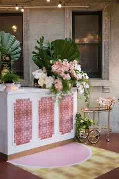 a flower display with pink and white flowers