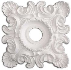 a white decorative object on a white background