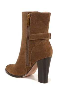 An almond toe and a sturdy stacked block heel frame a striking leather boot fashioned with a wraparound goldtone buckle. 4" heel (size 8.5) 5 3/4" shaft

 Leather upper, lining and sole Imported Mocha Brown, Leather Boot, Veronica Beard, Ankle Booties, Fashion Boots, Mocha, Leather Boots, Nordstrom Rack, Block Heels