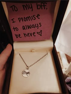 someone is holding up a necklace in their box that says to my boyfriend, i promise to always be never