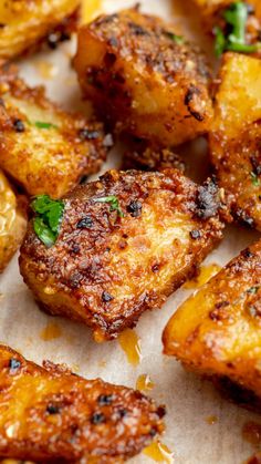 some fried food is sitting on a piece of paper