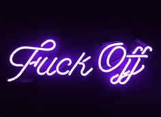 a purple neon sign that says truck off