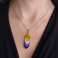 view size guide Chevron Pendant made in yellow, white, purple and black to best match the Nonbinary pride flag.💛 lightweight aluminum - comfortable and easy to wear/stack🤍 adjustable chain length up to 2" longer than the length you select from the drop-down menu💜 approximately 2" long (including bail) and 0.5" wide🖤Aluminum links with stainless steel chain, pendant bail and lobster claw clasp NONBINARY PRIDE - black, grey, white, violet Pride Jewelry Necklaces, Nonbinary Jewelry, Pride Stuff, Pride Necklace, Non Binary Pride, White Violet, Pendant Bail, Pride Jewellery, Pendant Bails