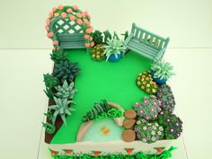 a cake that is shaped like a garden