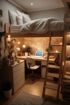 a loft bed with a desk underneath it and stairs leading up to the top floor