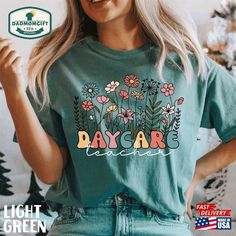 Comfort Colors® Wildflowers Daycare Teacher Shirt Gift Classic T-Shirt Check more at https://dadmomgift.com/product/comfort-colors-wildflowers-daycare-teacher-shirt-gift-classic-t-shirt/ Daycare Teacher Shirts, Daycare Outfits Teachers, Daycare Teacher Outfits, Endoscopy Nurse, Daycare Outfits, Gift For Maid Of Honor, Bridal Shower Shirts, Daycare Teacher, Cute Shirt Designs