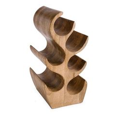 a wooden object with multiple sections stacked on top of each other, in the shape of a spiral