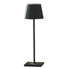 a lamp with a black shade on it