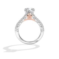 a white and rose gold engagement ring