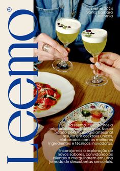 two people holding wine glasses with food on the table in front of them and an advertisement for celebrato