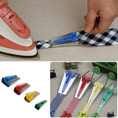 a person is ironing clothes with an iron and several different colored clips on the floor